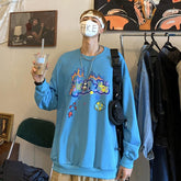 Sudadera holgada corta con estampado de burbujas en azul, negro y blanco